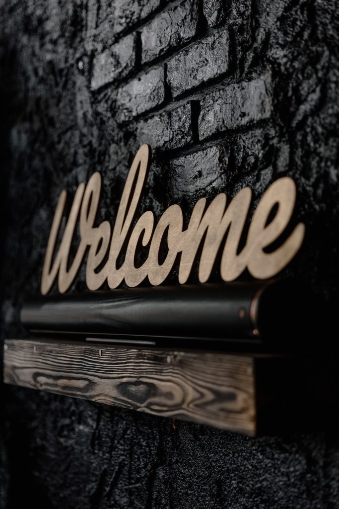 Wooden Carved Word Welcome
