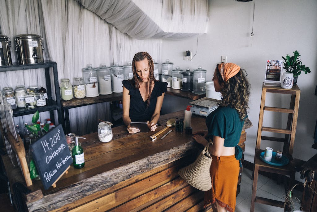 Seller Preparing Bill for Bathroom Accessories